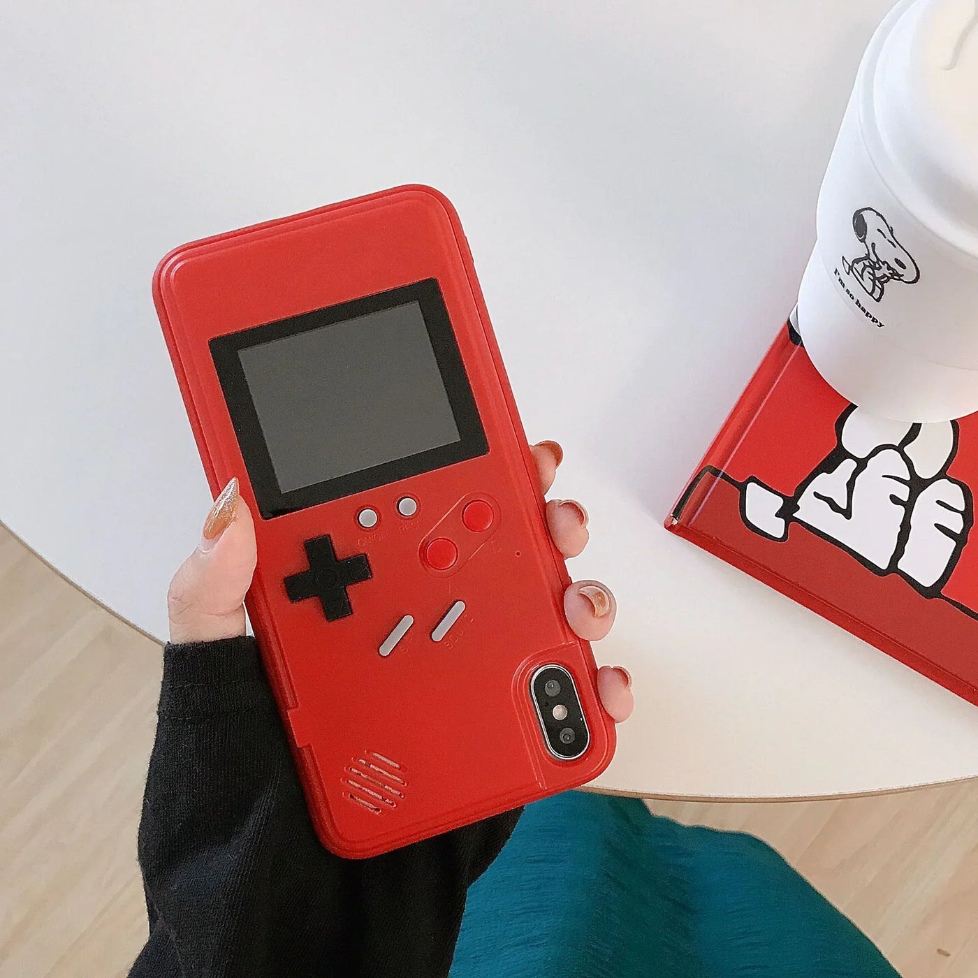 Retro Gameboy Phone Case Retro Gameboy-style phone case with classic button design.